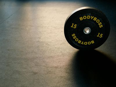 Minimalist gym space with high quality strength training equipment